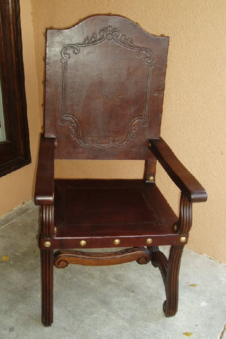 hand tooled leather armchair in Olinda Romani's Valencia design made in Peru