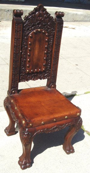 Isabellina children's side chair - Brown wooden children chair with leather seat and intricate woodcarvings on the legs and seat back.