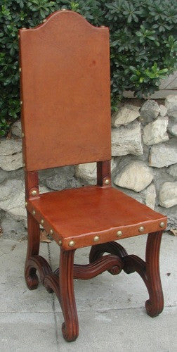 handmade leather Valencia side chair - Spanish style brown wooden chair with leather seat and intricate woodcarvings on the legs.